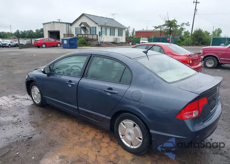 2007 Honda Civic Hybrid from USA, damaged, VIN JHMFA362X7S014518